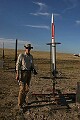 Ian and the GL Vertical Assault with K400 motor. The laptop and <br />antennae were used to reboot the Telemetrum once <br />the rocket was oriented vertically...