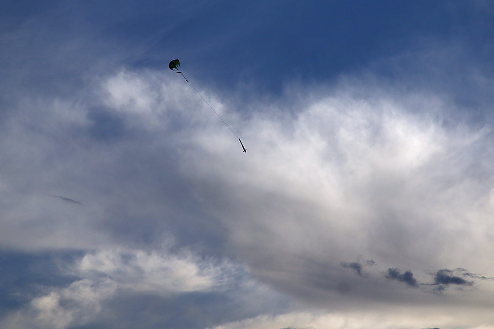 and then fully inflate, slowing <br />the rocket down...