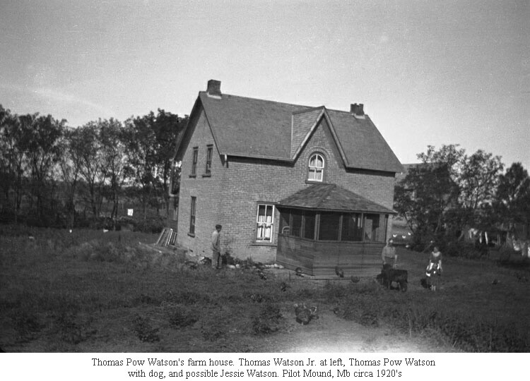 Thomas Pow Watson's farm house. Thomas Watson Jr. at left, Thomas Pow Watson <br />with dog, and possible Jessie Watson. Pilot Mound, Mb circa 1920's