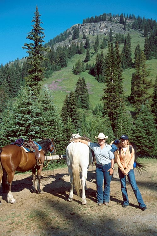 Starting out for Skoki with our trail guide, halfway up the <br />Temple fire road, Lake Louise.